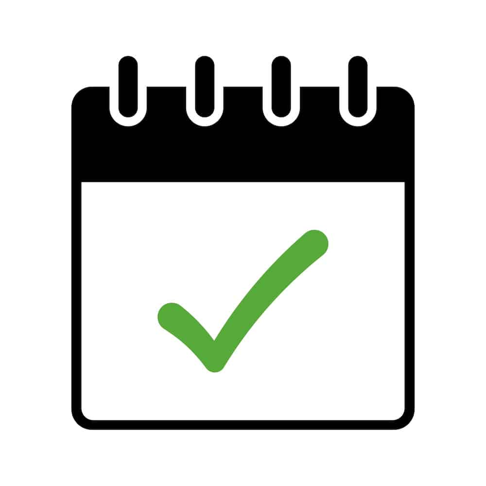 Calendar with green check mark